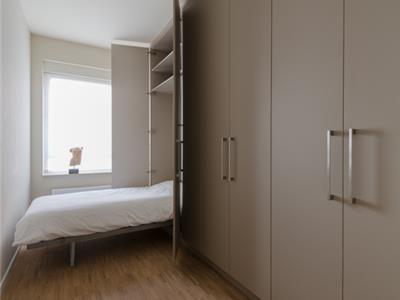 Dressing met bed in kast